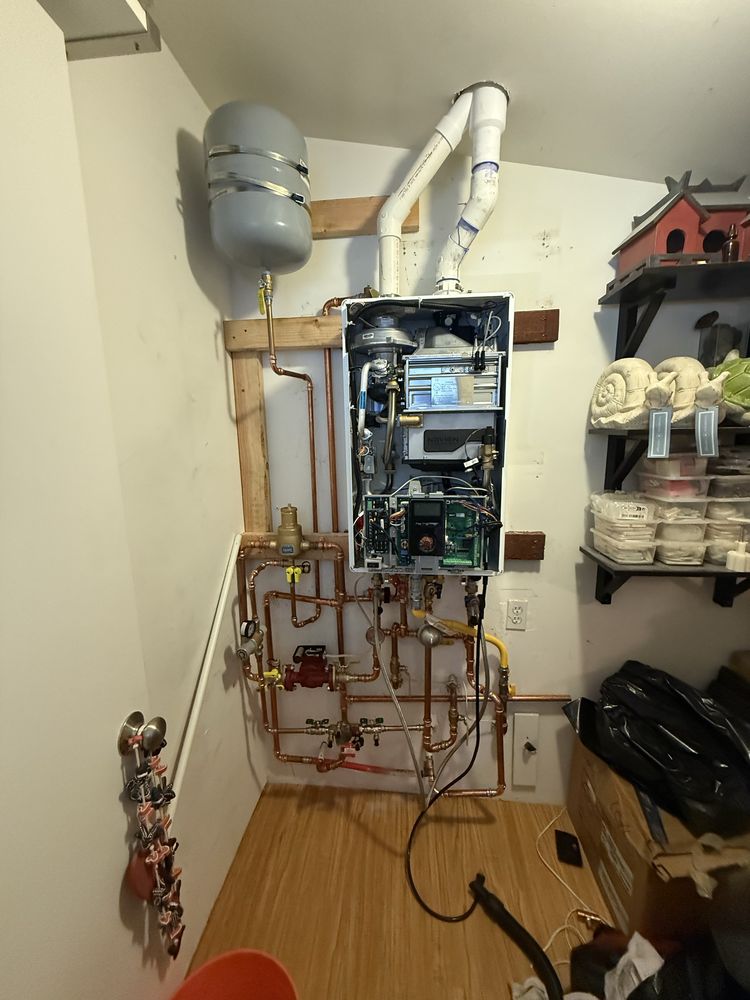 Newly installed tankless water heater and copper piping system by 5Star Plumbing Remodel
